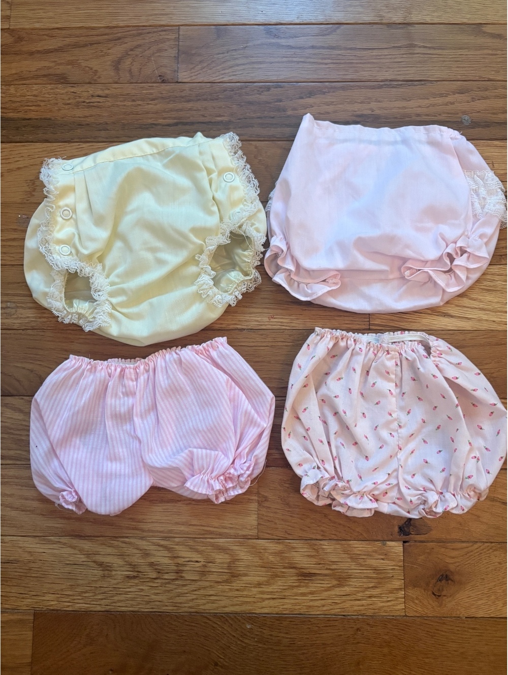 Set of 4 Vintage Baby Bloomers with Lace and Ruffle Details in Pastel Colors